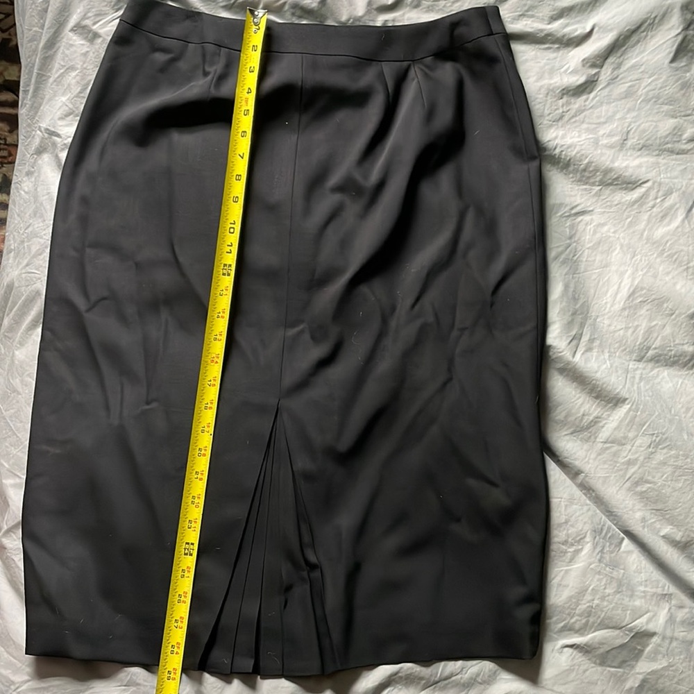 Talbots wool pencil skirt with pleat in back.  98% wool, 2%Lycra.